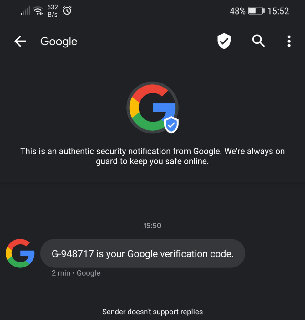 Text message on the phone with Google verification code