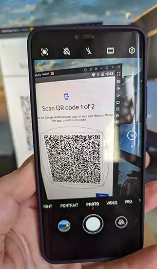 Taking picture of the QR code generated by the GA app for later use.